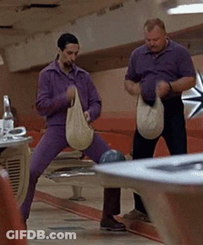 Purple Pants Men Holding Bags At Bowling Alley GIF