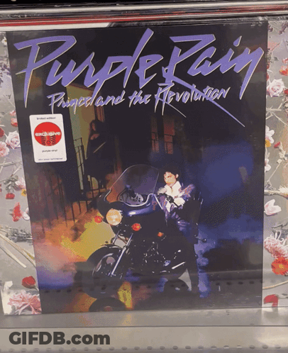 Purple Rain Prince And The Revolution Album Cover With A Motorcycle On It GIF