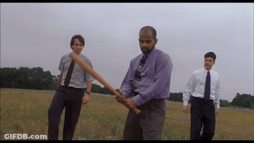 Purple Shirt Man Holding Bat With Two Men GIF