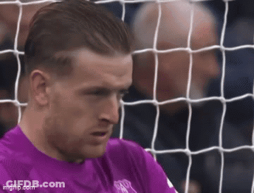 Purple Shirt Soccer Player Looking At Net GIF