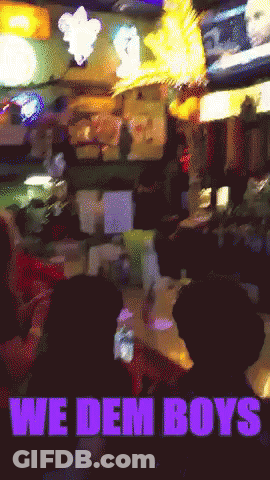 Purple Sign Saying We Dem Boys GIF