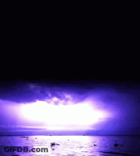 Purple Sky Over Water With Boats GIF