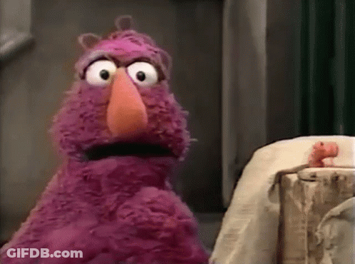 Purple Stuffed Animal With Orange Beak GIF
