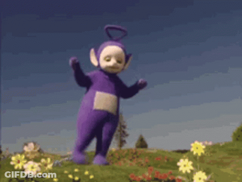 Purple Teletubby Teddy Bear Dancing In Flowers GIF
