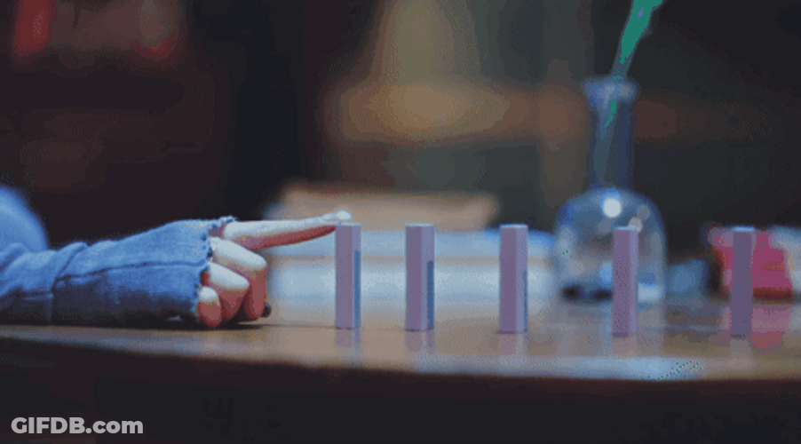 Pushing Playing Dominos Falling GIF