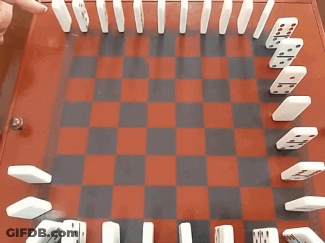 Pushing White Dominos Falling GIF