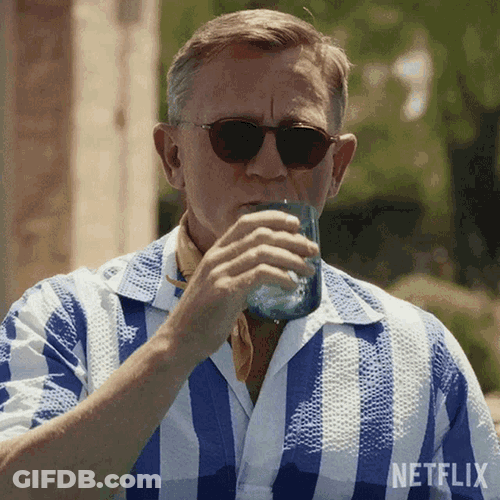 Putting Down Drink Benoit Blanc GIF