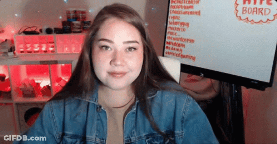 Putting On Glasses Confused Woman GIF