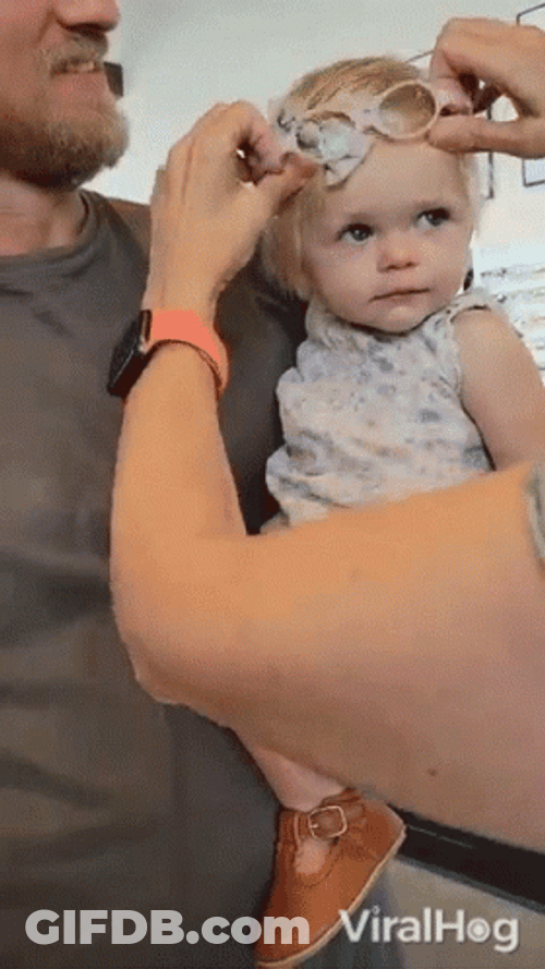 Putting On Glasses Cute Baby Girl GIF