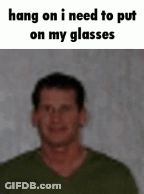 Putting On Glasses Hang On I Need GIF