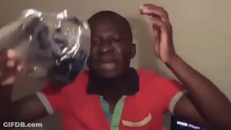 Putting On Tinfoil Hat While Crying GIF