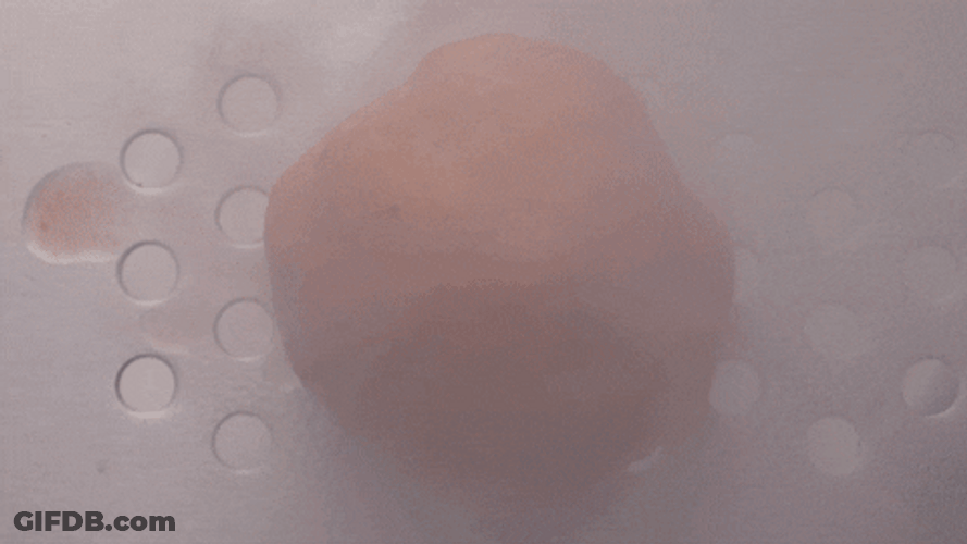 Putting Seasonings On Meatball GIF