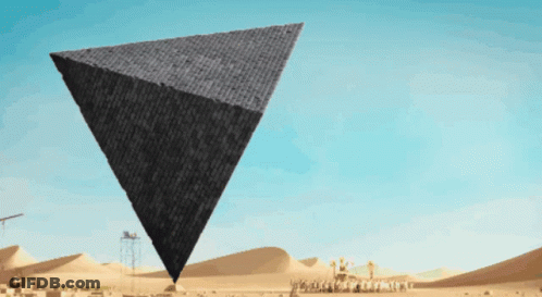 Pyramid Floating Over Desert GIF
