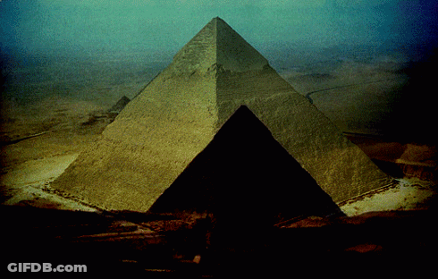 Pyramid In Desert With Blue Sky GIF