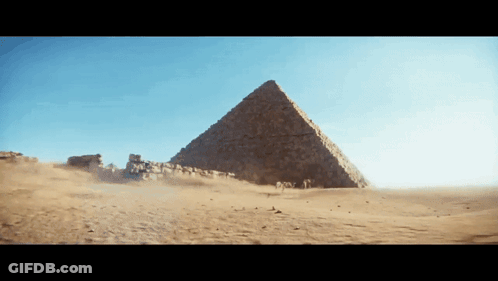 Pyramid In Desert With Dust GIF