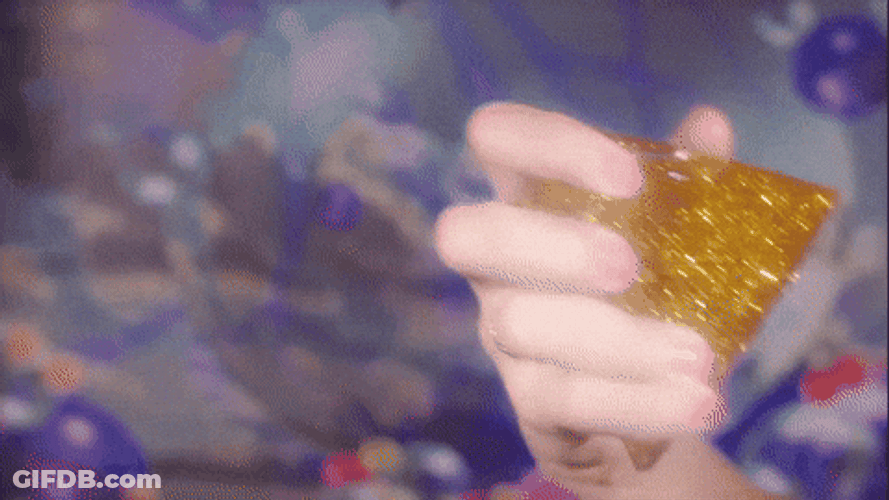 Pyramid Yellow Glitter Bomb GIF