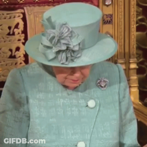 Queen Elizabeth Wearing A Blue Hat And A Blue Coat GIF
