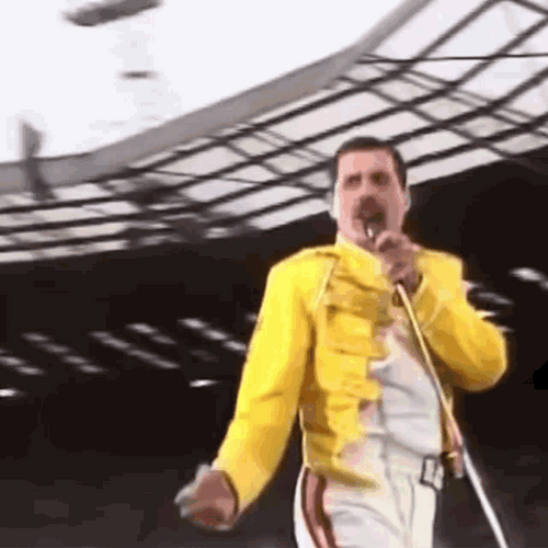 Queen Freddie Mercury Yellow Jacket Performance GIF