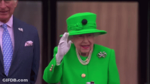 Queen In Green Hat And Coat GIF