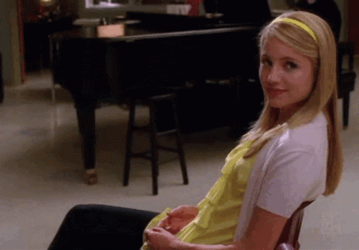 Quinn Fabray Sitting Shrug GIF
