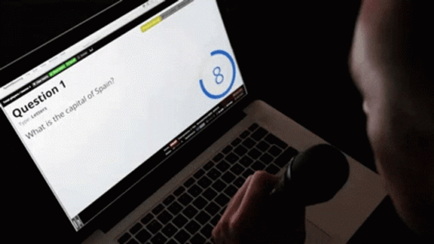 Quiz Host Reading Questions Laptop GIF