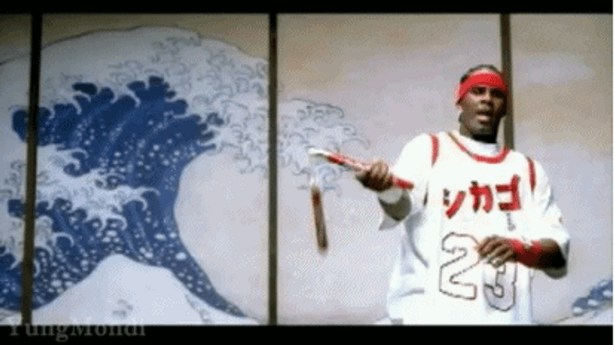 R Kelly Displaying Nunchuck Skills GIF