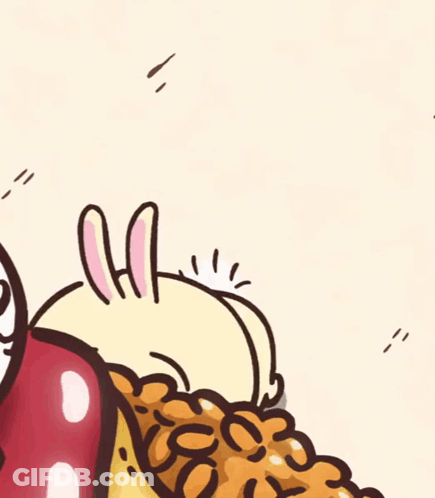 Rabbit Laying On Pile Of Beans GIF