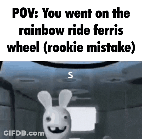 Rabbit With Mustache Smiling At Rainbow Ferris Wheel GIF