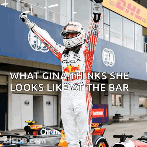 Race Car Driver Arms In Air In Front Of DHL Building GIF