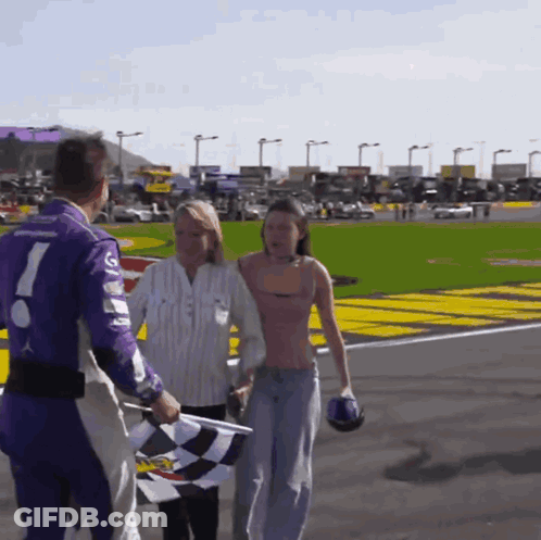 Race Car Driver In Purple Uniform Number 7 GIF