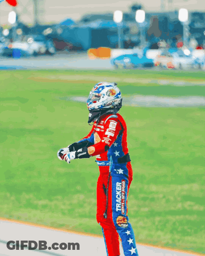 Race Car Driver In Red And Blue With Tracker Ad GIF