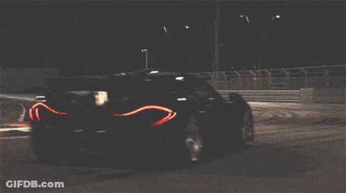 Race Car Driving Past Fence Saying Pennsylvania GIF