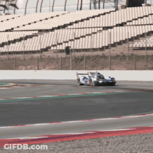 Race Car Driving Track Empty Bleachers GIF