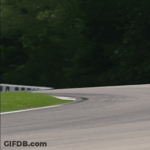 Race Car Going Around Curve GIF