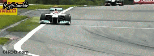 Race Car Going Around Curve F1-Gifs.tumblr GIF