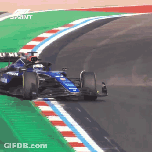 Race Car Going Around Curve With Sprint GIF