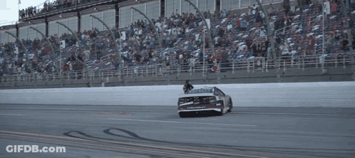 Race Car Number 77 Drifting GIF