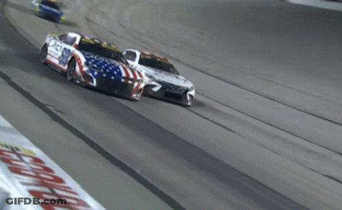Race Car Number 99 Driving On Track GIF