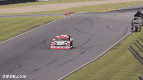 Race Car On Curve With 30 Sign GIF