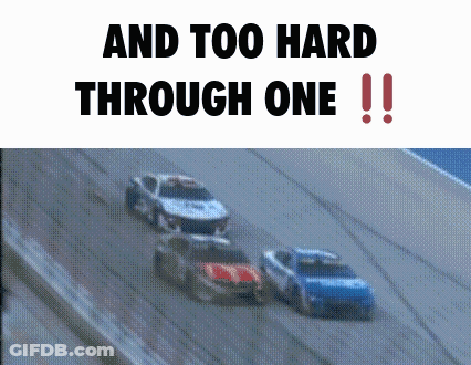 Race Car Racing Down Track And Too Hard Through One GIF