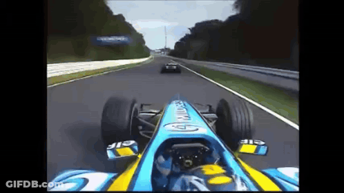 Race Car With Elf On Front GIF