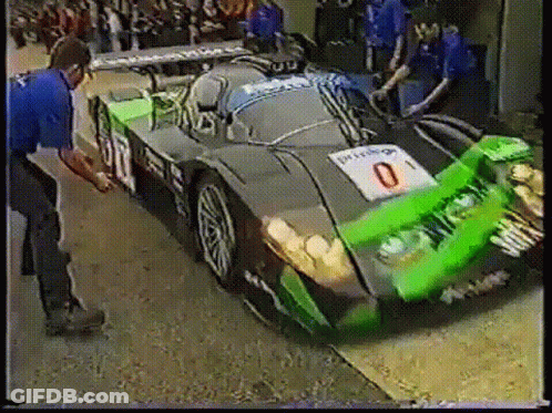 Race Car With Number 0 On Front GIF