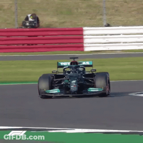 Race Car With Petronas On Side GIF