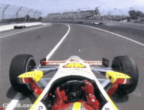 Race Car With Shell Logo GIF