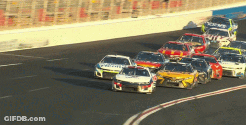 Race Cars Racing With Fireit On Side GIF