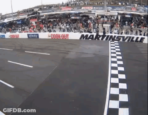 Race Track With Checkered Finish Line And Martinsville Sign GIF