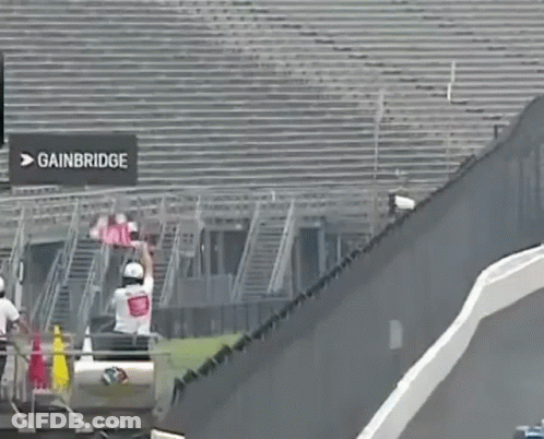 Race Track With Gainbridge Sign GIF