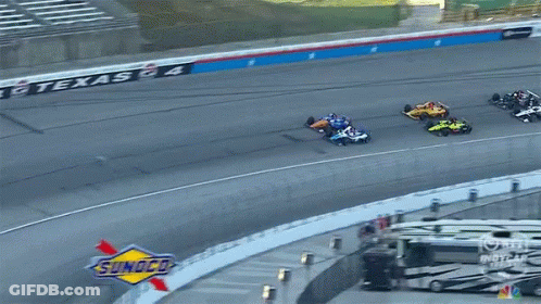Race Track With Sunoco Sign GIF