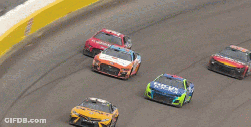 Race Track With Xfinity Sign Above Cars GIF