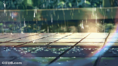 Rain Is Falling On A Tiled Floor And A Rainbow Is Visible GIF